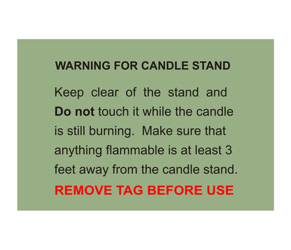 Warning label for candle stand with safety instructions on a green background