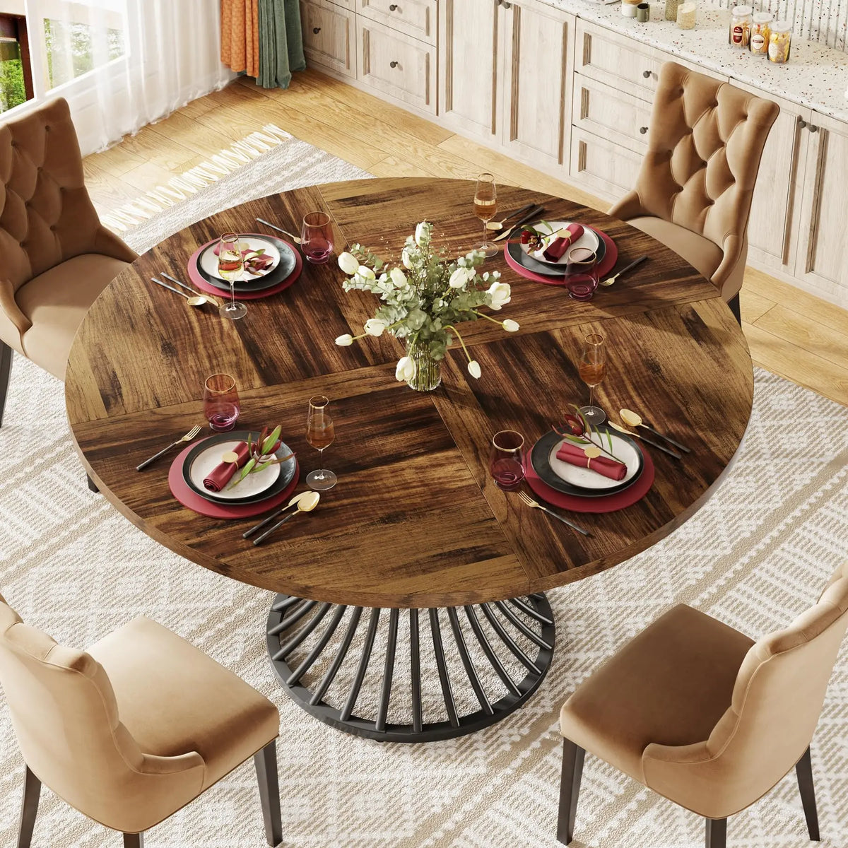 Dining table set with plates, cutlery, and a vase of flowers in a kitchen.