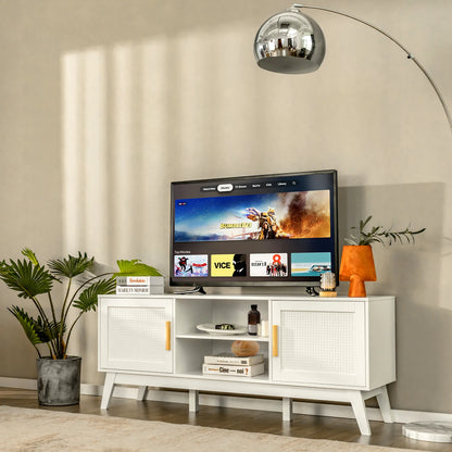 Modern living room with a Modern White Rattan TV Stand, plants, and a lamp.