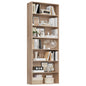 Wooden bookshelf with decorative items on a white background