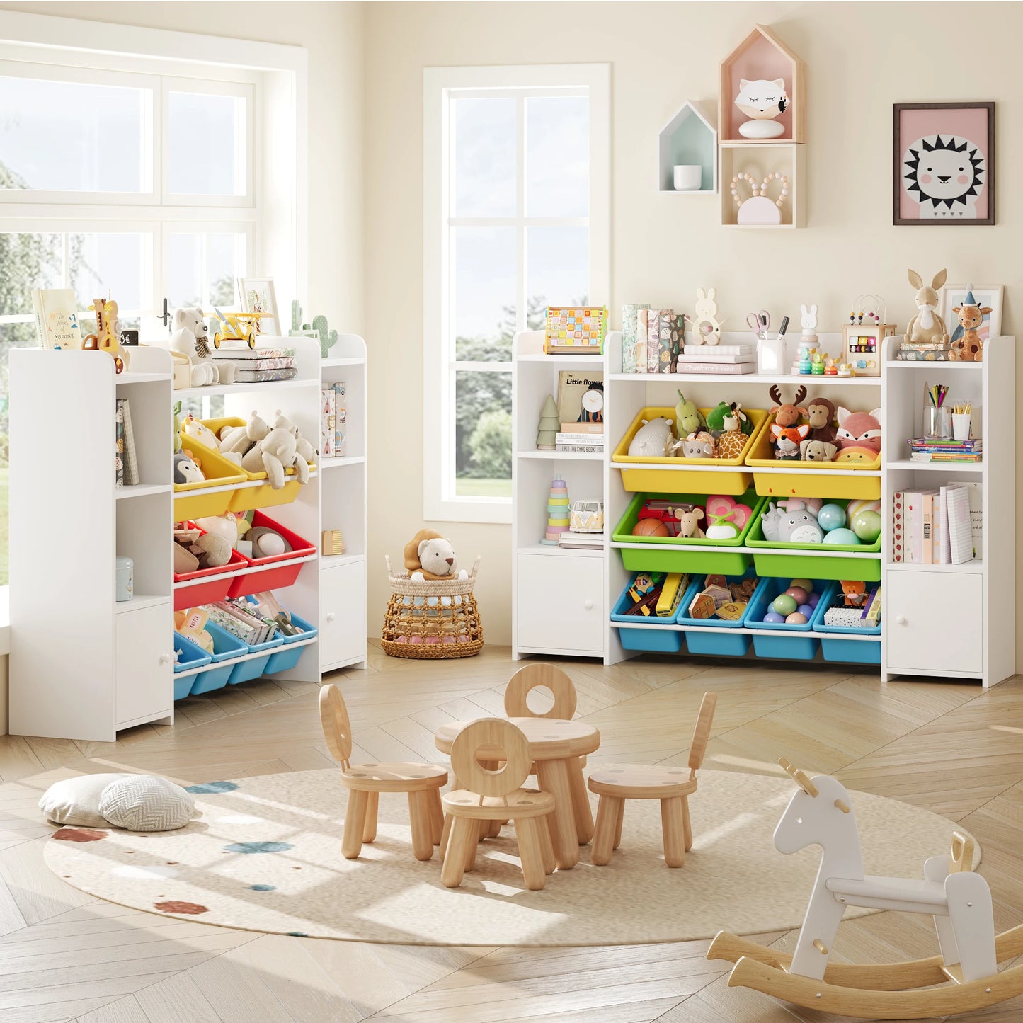 Children's playroom with white bookshelves, toys, and a small table and chairs set.