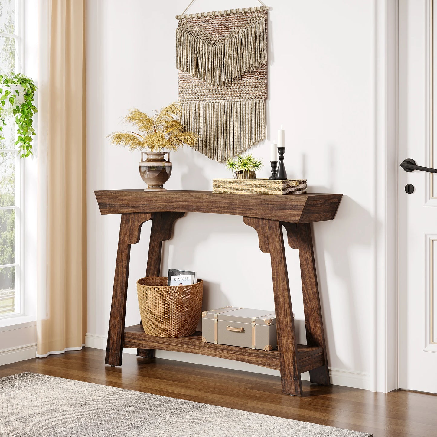 Wooden console table in a room with decor elements