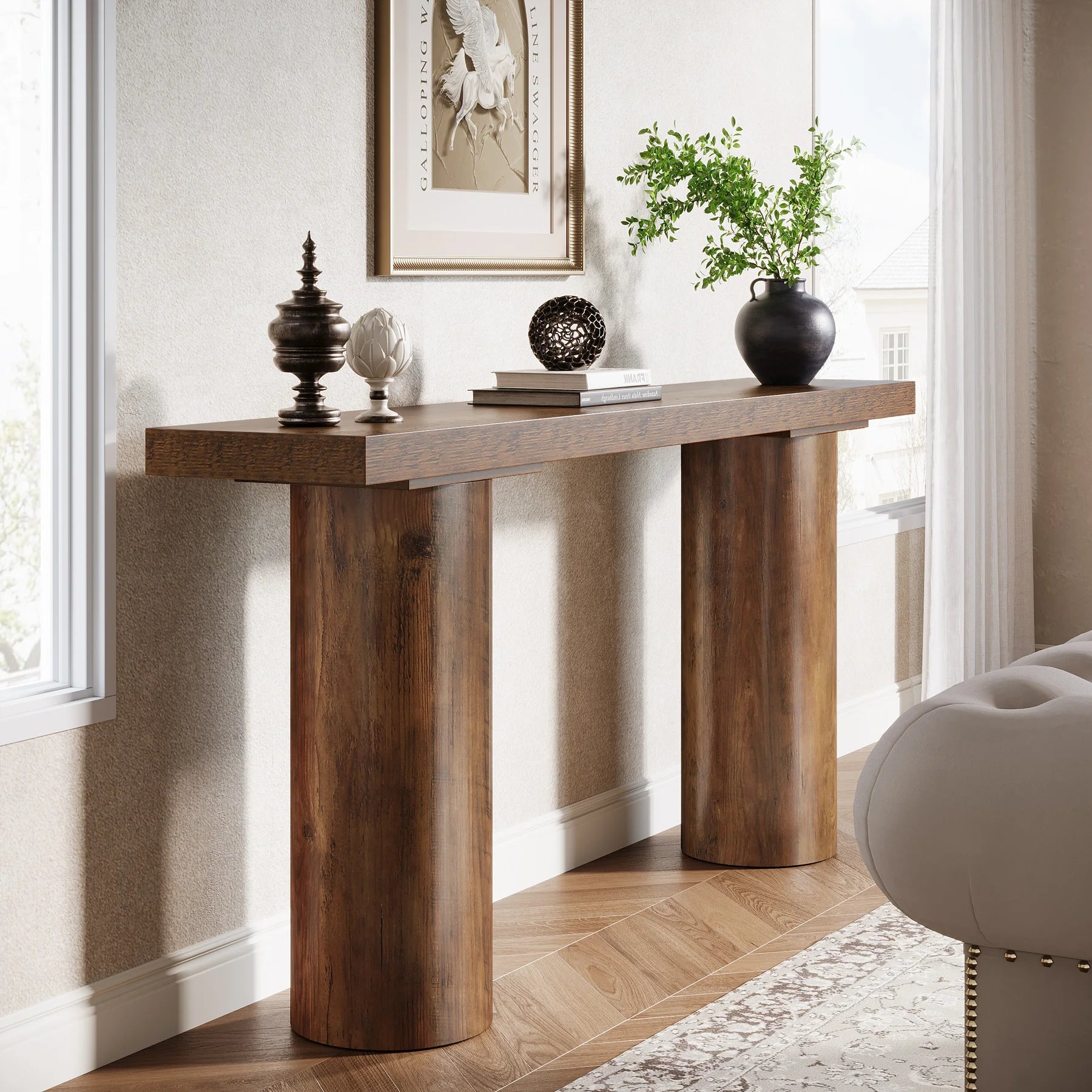 Wooden console table with decorative items in a room with a window and chair.